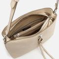 Engri kleine schoudertas met metalen details 