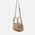 Croquito bolso de mano efecto ante con grabado animal print y asa bandolera extraíble 