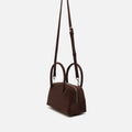 Croquito bolso de mano efecto ante con grabado animal print y asa bandolera extraíble 