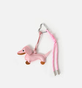 Buti llavero charm perro rosa 