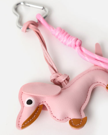 Buti llavero charm perro rosa 