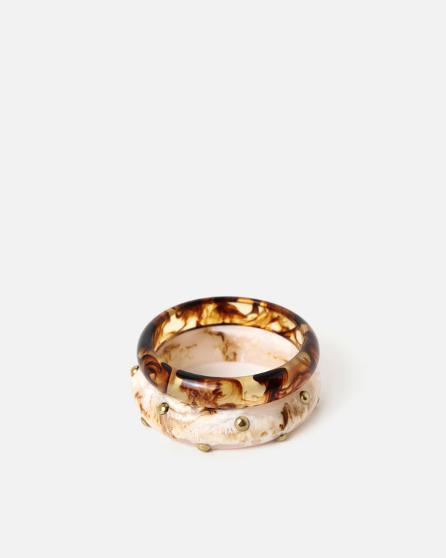 Farah pulsera rígida con detalles metálicos