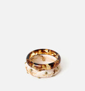Farah pulsera rígida con detalles metálicos 