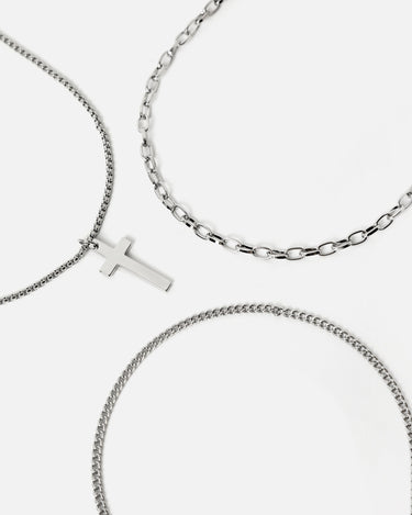 Horacio collar efecto tripe con colgante cruz 