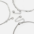 Horacio collar efecto tripe con colgante cruz 
