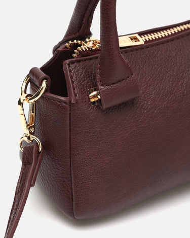 Segui bolso de mano pequeño con asa bandolera extraíble 