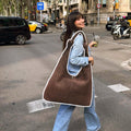 Pologi bolso de hombro efecto rafia 