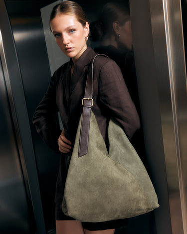 Vire bolso hobo grande efecto ante con cierre de botón 