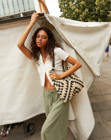 Ushu bolso hobo grande efecto rafia estampado 