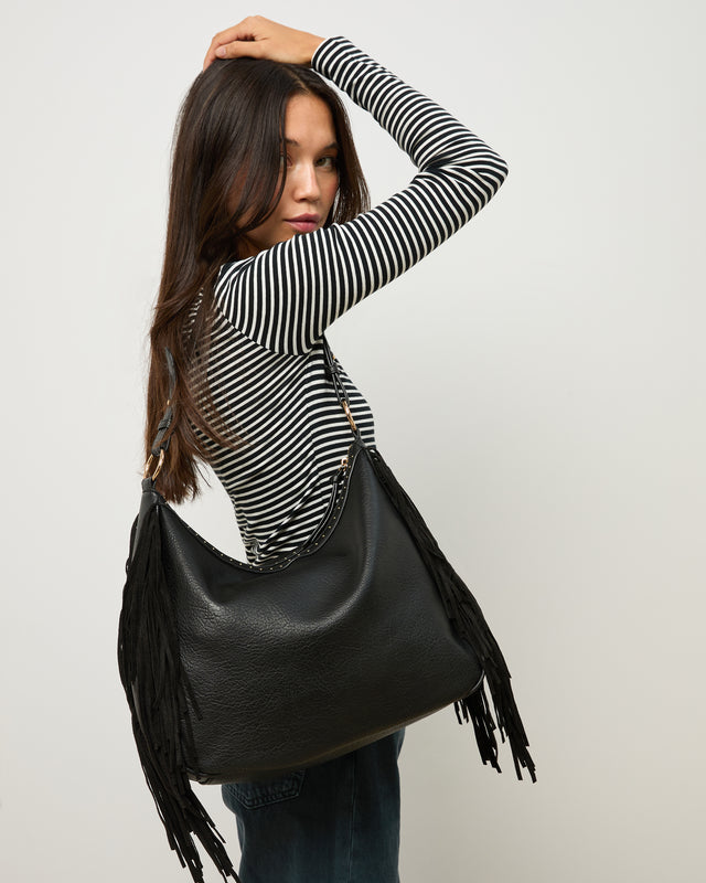 Chete hobo bag with fringes and metallic details