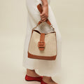 Sora bolso estilo hobo en polipiel y efecto rafia 